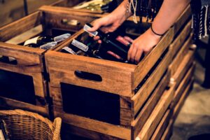 people-hands-getting-bottle-red-wine